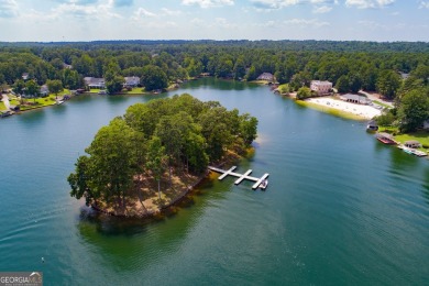 Discover lakeside living at its finest with this stunning on Fairfield Plantation Golf and Country Club in Georgia - for sale on GolfHomes.com, golf home, golf lot