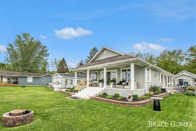 Don't miss this incredible opportunity to own the lakehouse of on Holland Lake Golf Course Inc. in Michigan - for sale on GolfHomes.com, golf home, golf lot