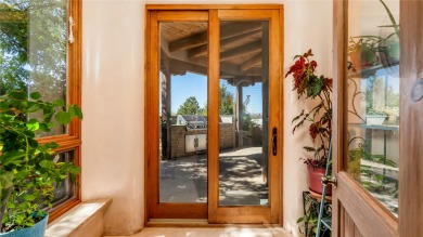 Located on a private cul-de-sac on the 8th hole of the Sunrise on The Club At Las Campanas  in New Mexico - for sale on GolfHomes.com, golf home, golf lot