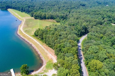 Discover lakeside living at its finest with this stunning on Fairfield Plantation Golf and Country Club in Georgia - for sale on GolfHomes.com, golf home, golf lot