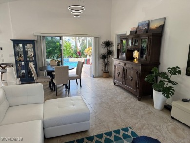 This is an amazing pool home nestled safely inside the gated 55+ on Sabal Springs Golf and Racquet Club in Florida - for sale on GolfHomes.com, golf home, golf lot