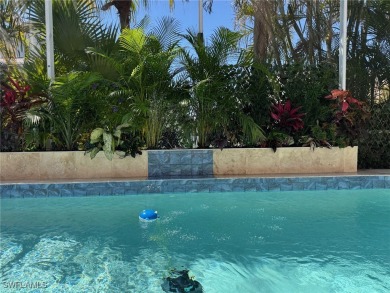 This is an amazing pool home nestled safely inside the gated 55+ on Sabal Springs Golf and Racquet Club in Florida - for sale on GolfHomes.com, golf home, golf lot