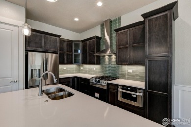 The Duxbury by Landmark Homes offers ranch style living + on Highland Meadows Golf Course in Colorado - for sale on GolfHomes.com, golf home, golf lot