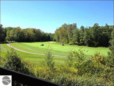 This turn key 2-bedroom, 2-bathroom condo offers beautiful golf on  in Michigan - for sale on GolfHomes.com, golf home, golf lot