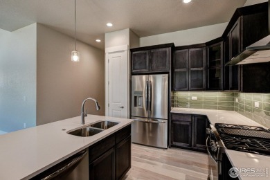The Duxbury by Landmark Homes offers ranch style living + on Highland Meadows Golf Course in Colorado - for sale on GolfHomes.com, golf home, golf lot