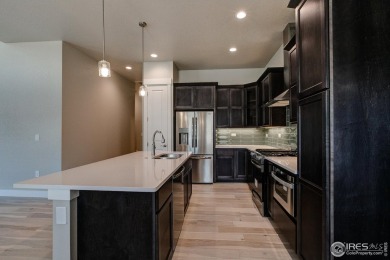 The Duxbury by Landmark Homes offers ranch style living + on Highland Meadows Golf Course in Colorado - for sale on GolfHomes.com, golf home, golf lot