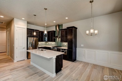 The Duxbury by Landmark Homes offers ranch style living + on Highland Meadows Golf Course in Colorado - for sale on GolfHomes.com, golf home, golf lot