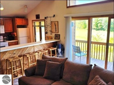 This turn key 2-bedroom, 2-bathroom condo offers beautiful golf on  in Michigan - for sale on GolfHomes.com, golf home, golf lot