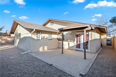 Situated a block east of Cerbat Hills Golf Course, this properly on Cerbat Cliffs Golf Course in Arizona - for sale on GolfHomes.com, golf home, golf lot