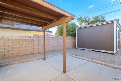 Situated a block east of Cerbat Hills Golf Course, this properly on Cerbat Cliffs Golf Course in Arizona - for sale on GolfHomes.com, golf home, golf lot