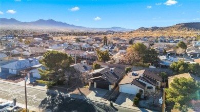 Situated a block east of Cerbat Hills Golf Course, this properly on Cerbat Cliffs Golf Course in Arizona - for sale on GolfHomes.com, golf home, golf lot