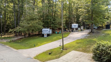 Golf Cart will convey with acceptable offer!! Discover a on River Golf and Country Club at Lake Royale in North Carolina - for sale on GolfHomes.com, golf home, golf lot