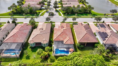 Experience refined living in this beautifully upgraded PGA on PGA Golf Club in PGA Village in Florida - for sale on GolfHomes.com, golf home, golf lot