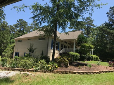 Must see FIXER UPPER golf home overlooking 6th hole of on Monticello Golf Club At Savannah Lakes in South Carolina - for sale on GolfHomes.com, golf home, golf lot