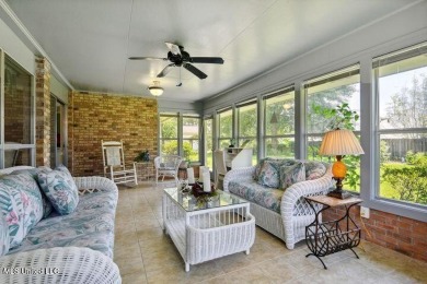 Charming 3-bedroom 2-bathroom home nestled on a beautifully on Diamondhead Country Club in Mississippi - for sale on GolfHomes.com, golf home, golf lot