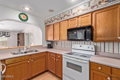 Great floorplan to this spacious  furnished 2 bedroom 1.75 bath on Fountain of the Sun Country Club in Arizona - for sale on GolfHomes.com, golf home, golf lot