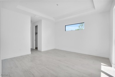 This new construction 3-bedroom plus den, 2-bath home offers 1 on Rotonda Golf and Country Club - Long Marsh  in Florida - for sale on GolfHomes.com, golf home, golf lot