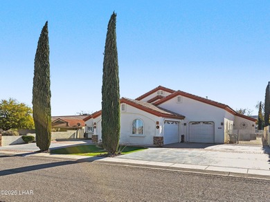 Experience golf course living at its finest in this beautifully on Cerbat Cliffs Golf Course in Arizona - for sale on GolfHomes.com, golf home, golf lot