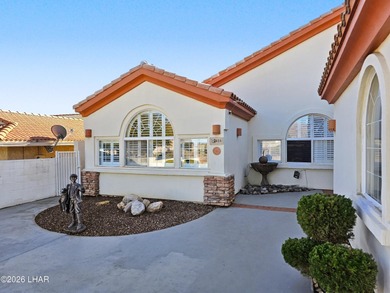 Experience golf course living at its finest in this beautifully on Cerbat Cliffs Golf Course in Arizona - for sale on GolfHomes.com, golf home, golf lot