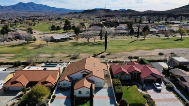 Experience golf course living at its finest in this beautifully on Cerbat Cliffs Golf Course in Arizona - for sale on GolfHomes.com, golf home, golf lot