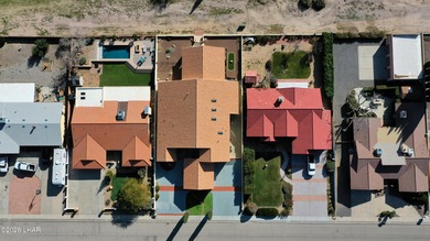 Experience golf course living at its finest in this beautifully on Cerbat Cliffs Golf Course in Arizona - for sale on GolfHomes.com, golf home, golf lot