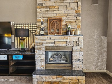 Experience golf course living at its finest in this beautifully on Cerbat Cliffs Golf Course in Arizona - for sale on GolfHomes.com, golf home, golf lot