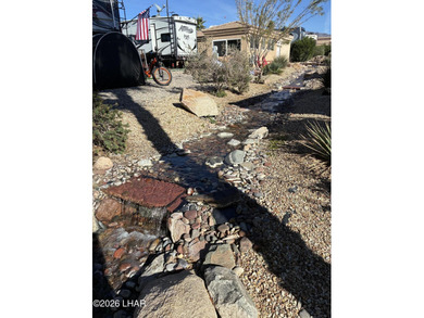 Large lot & beautiful area has babbling brook on the rear. Lot on The Refuge Golf and Country Club in Arizona - for sale on GolfHomes.com, golf home, golf lot