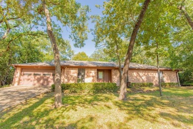 Welcome to this Traditional 3 bedroom, 2 bathroom home nestled on Hide-A-Way Lake Golf Course in Texas - for sale on GolfHomes.com, golf home, golf lot