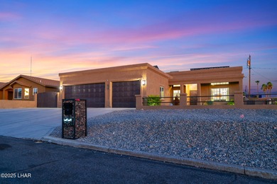 Immaculate south side Havasu home on a quiet street between the on London Bridge Golf Course in Arizona - for sale on GolfHomes.com, golf home, golf lot