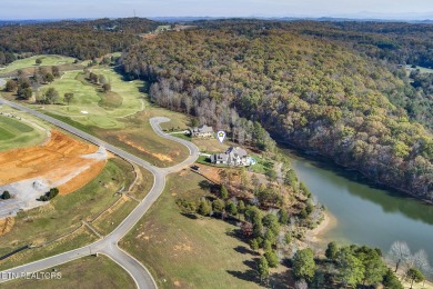 Enjoy lakeside living with this gently sloping waterfront lot on on Wind River Golf Course in Tennessee - for sale on GolfHomes.com, golf home, golf lot