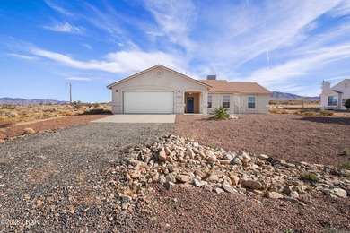 Located in a welcoming golf course community right off Route 66 on Valle Vista Golf Course in Arizona - for sale on GolfHomes.com, golf home, golf lot