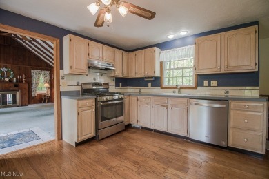 Located in a peaceful neighborhood with a beautiful, wooded on Green Ridge Golf Course in Ohio - for sale on GolfHomes.com, golf home, golf lot