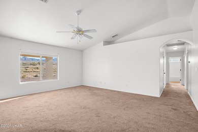 Located in a welcoming golf course community right off Route 66 on Valle Vista Golf Course in Arizona - for sale on GolfHomes.com, golf home, golf lot