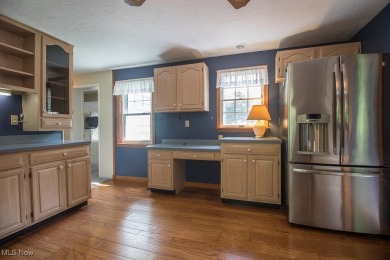 Located in a peaceful neighborhood with a beautiful, wooded on Green Ridge Golf Course in Ohio - for sale on GolfHomes.com, golf home, golf lot