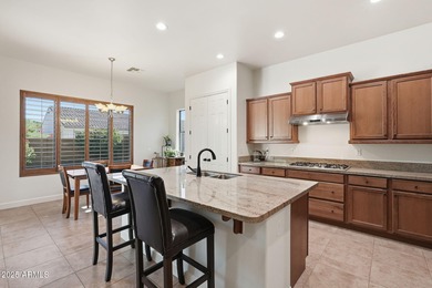 Welcome to this beautifully maintained 2,700 sq. ft. home in one on Tuscany Falls At Pebble Creek in Arizona - for sale on GolfHomes.com, golf home, golf lot