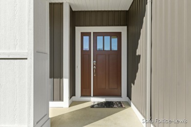 Welcome home! This beautiful custom condo in Andre's Crossing is on Sunnybrook Country Club in Michigan - for sale on GolfHomes.com, golf home, golf lot