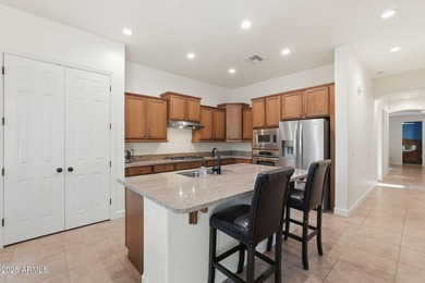 Welcome to this beautifully maintained 2,700 sq. ft. home in one on Tuscany Falls At Pebble Creek in Arizona - for sale on GolfHomes.com, golf home, golf lot