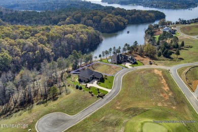 Enjoy lakeside living with this gently sloping waterfront lot on on Wind River Golf Course in Tennessee - for sale on GolfHomes.com, golf home, golf lot