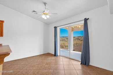 Located in a welcoming golf course community right off Route 66 on Valle Vista Golf Course in Arizona - for sale on GolfHomes.com, golf home, golf lot