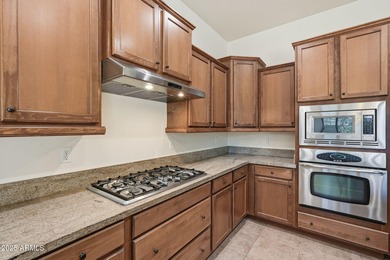 Welcome to this beautifully maintained 2,700 sq. ft. home in one on Tuscany Falls At Pebble Creek in Arizona - for sale on GolfHomes.com, golf home, golf lot