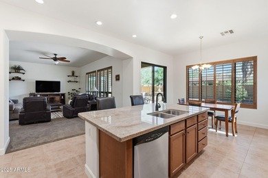 Welcome to this beautifully maintained 2,700 sq. ft. home in one on Tuscany Falls At Pebble Creek in Arizona - for sale on GolfHomes.com, golf home, golf lot