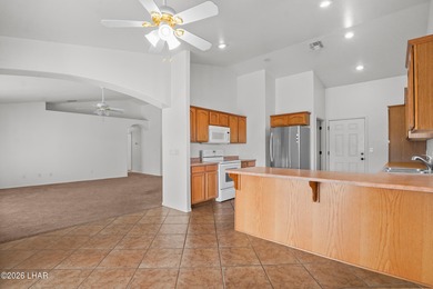 Located in a welcoming golf course community right off Route 66 on Valle Vista Golf Course in Arizona - for sale on GolfHomes.com, golf home, golf lot