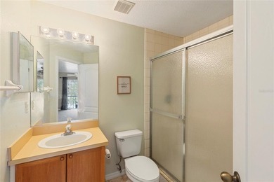 Wake up each morning to peaceful golf course views in this on East Bay Golf Club in Florida - for sale on GolfHomes.com, golf home, golf lot