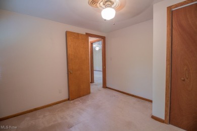 Located in a peaceful neighborhood with a beautiful, wooded on Green Ridge Golf Course in Ohio - for sale on GolfHomes.com, golf home, golf lot