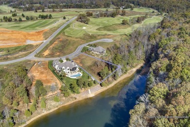 Enjoy lakeside living with this gently sloping waterfront lot on on Wind River Golf Course in Tennessee - for sale on GolfHomes.com, golf home, golf lot