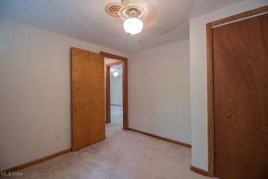 Located in a peaceful neighborhood with a beautiful, wooded on Green Ridge Golf Course in Ohio - for sale on GolfHomes.com, golf home, golf lot