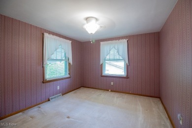 Located in a peaceful neighborhood with a beautiful, wooded on Green Ridge Golf Course in Ohio - for sale on GolfHomes.com, golf home, golf lot