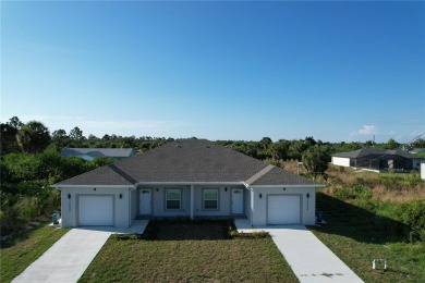 This Duplex is head to toe luxury finishes from quartz counter on Duffys Golf Center in Florida - for sale on GolfHomes.com, golf home, golf lot