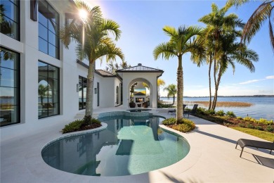 Spectacular lakefront, new construction in Bay Point, a private on Arnold Palmers Bay Hill Club and Lodge  in Florida - for sale on GolfHomes.com, golf home, golf lot