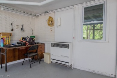 Located in a peaceful neighborhood with a beautiful, wooded on Green Ridge Golf Course in Ohio - for sale on GolfHomes.com, golf home, golf lot